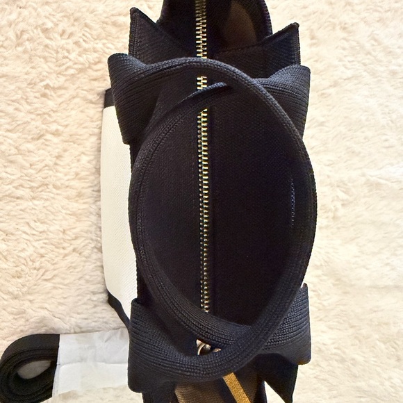 New in Box & Authentic Rothy’s The Mini Hand Bag - Piano Keys - Picture 2 of 8